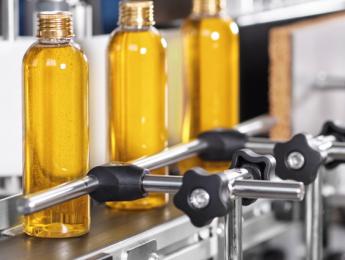 Quality - glass bottles on production line

