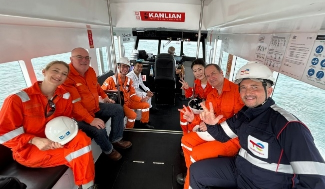 Gerard (first from right) onboard a pilot boat to inspect TotalEnergies Marine Fuels’ deployed LNG supply vessel, the Brassavola, with Frederic Meyer, Head of Strategy and Projects Department (second from right), Glenn Wong (third from left), Eunseo-Ruby Jeong, Bunker Operator (third from right), Philippe Lemaire, TotalEnergies’ Marketing & Services Branch Toxicologist (second from left) and Nina Molina Kjeholt, representative of Mitsui O.S.K. Lines, Ltd Asia (first from left).